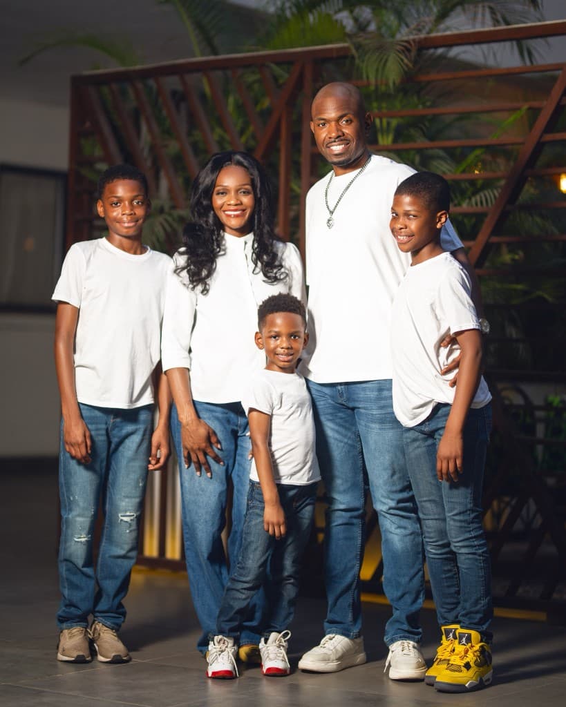 Pastor RichieO with Lady Trisha and their sons in white and denim